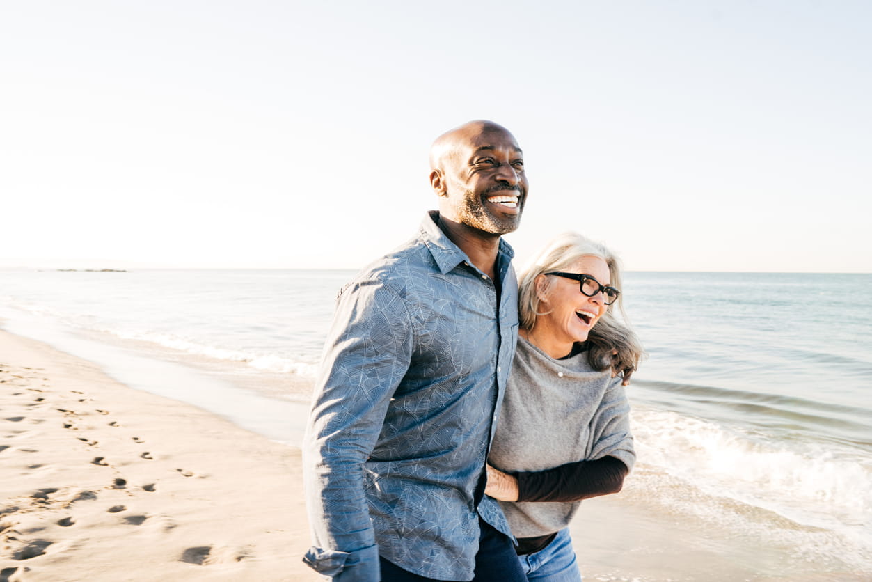 Senior couple reviewing Medicare plans with a licensed agent